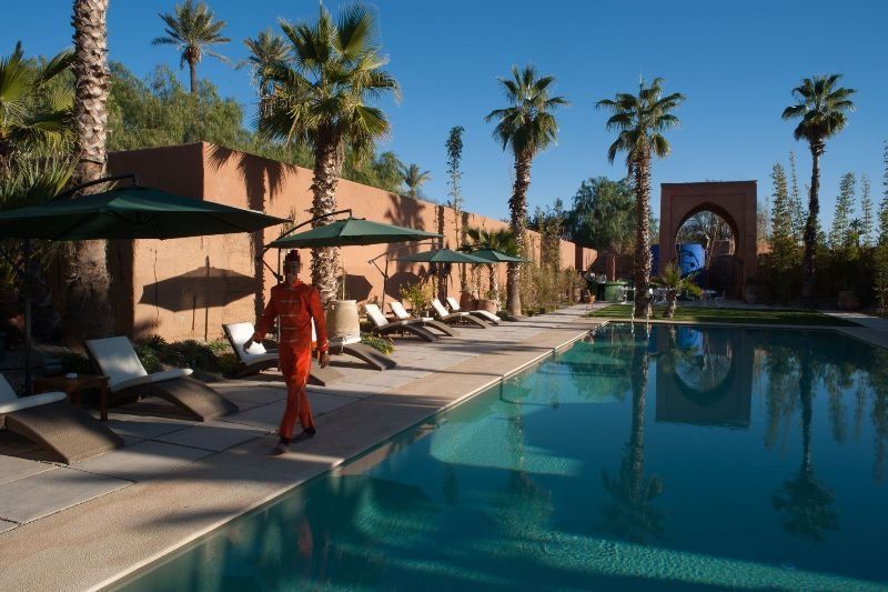 Tigmiza Boutique Hotel & Spa Ouled Jelal Bagian luar foto The swimming pool at the Ouarzazate hotel